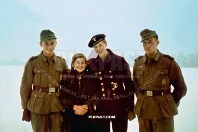 Very young mountain troop soldiers with Kriegsmarine matrose with Mine Sweeper Badge. Alt Otting Bavaria Germany 1943