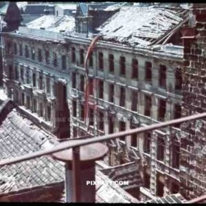 WW2 color Austria Vienna Wien Russian attack bombed 1945 rooftop citiy destroyed rubble ruins red flag