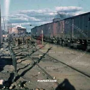 WW2 color Belgium 1945 Bombed German supply Train Station wagons 88mm ammo exploded