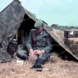 Wehrmacht Doctor preparing his map case in army tent. Russian Front 1941. Arztes San.Kp.126. Heeresgruppe Nord