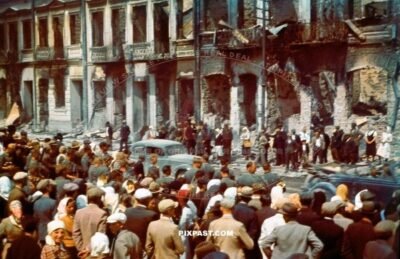Wehrmacht army vehicle convoy drive through bombed destroyed Smolensk Russia 1941, Parade, Civilians.