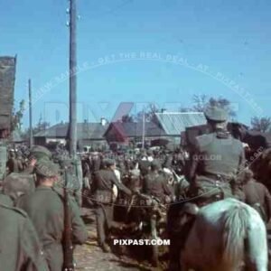 Wehrmacht convoy marching through Potschew, Russia 1944