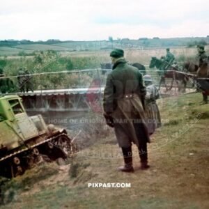 Wehrmacht crossing pontoon bridge. Smolensk 1941. Horch 901 jeep and Russian Komintern 1933 Heavy Artillery Tractor