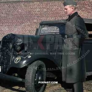 Wehrmacht soldier in Niederaußem (Von-Galen-Weg), Germany 1940. Adler 2 Liter Cabriolet EV 1938. 4th Panzer Division.