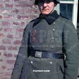 Wehrmacht soldier with helmet in Niederaußem, Germany 1940