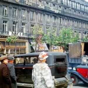 Well dressed women and men passing Parisian taxi cars in Paris France 1945. Liberation. Rose Marie Chateletet. Langel.