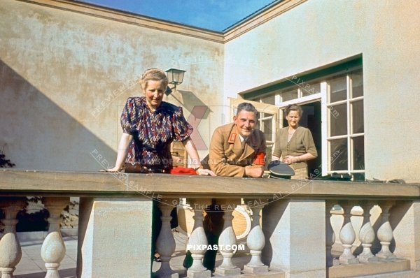 Wife on balcony in Munich Bavaria Germany with a visit from a SA brown shirt local political officer 1939