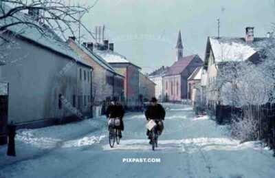Winter 1940 bike cycle snow village town Bavaria church parcels post