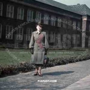 Woman standing in front of the Grassi Museum in Leipzig, Germany 1940