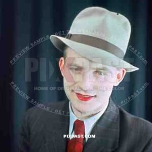 Young Austrian man in American style 20s hat and jacket with red lipstick, theatre show 1937, Later becomes war reporter.