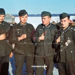 Young German army soldiers wearing OST red ribbon and new awarded iron cross with combat badge. Russia 1942