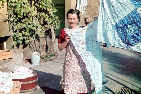 Young German women drying her freshly washed cloths in the backyard of her apartment in Halle Saale Germany 1939