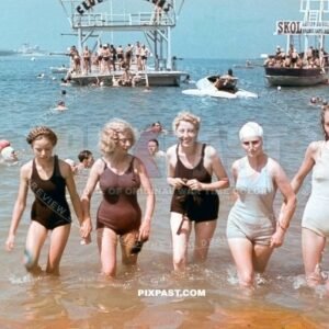 Young french women in swim suites playing the sea and beach in Saint Nazaire westcoast France September 1940