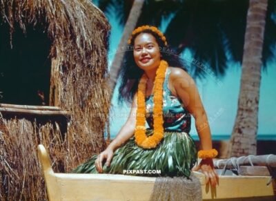 Young local women in traditional hula costumes at a beach bar in Hawaii Island September 1941