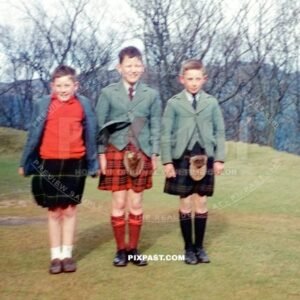 Young man Ian Miller standing with his friends in traditional Scottish kilt near Edinburgh Scotland. War time 1944