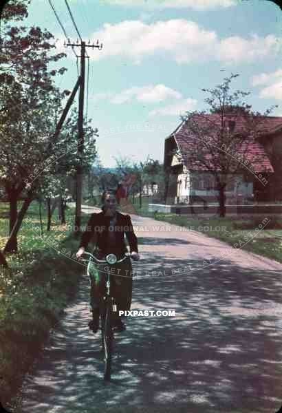 american tourist woman on bike in Freiburg, Germany 1939