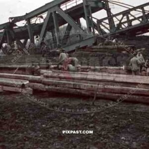 construction of a wooden bridge next to a broken rail bridge near Belgrade, Serbia ~1941