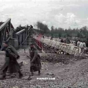 construction of a wooden bridge next to a broken rail bridge near Belgrade, Serbia ~1941