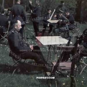 field police drinking beer and resting in garden kar98 rifles black uniforms