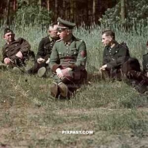 field police officer with his troops resting in forest 1939