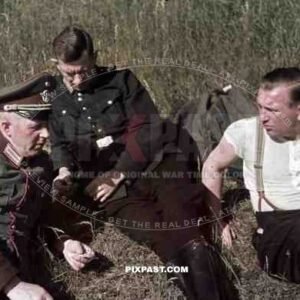 field police uniform black uniform resting in hay field 1939