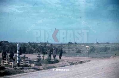 halftrack german soldier grave stones graveyard cross roads dust russian summer 19th Panzer Division Heeresgruppe Mittle 1941