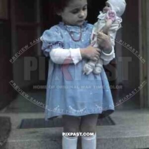 little girl with her doll in Germany 1938