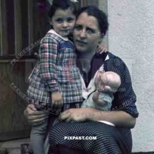 little girl with her mother and a doll in Germany 1938