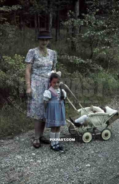 mother going for a walk with her children, Germany 1938