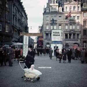 mother with baby in a pram at the market place in Leipzig, Germany 1941