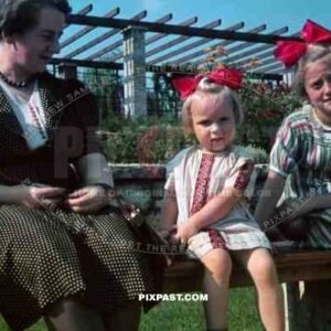 mother with daughters in the Palmengarten (Palm Garden) in Leipzig, Germany 1940