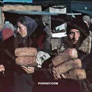 peasant women with loafs at the market, Romania 1942