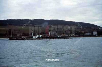 river paddle steamer on River Rhine, Rüdesheim, Hessen, 1939. Shell oil refinery.