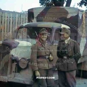 two Wehrmacht officers having a break in Potschow, Russia 1944
