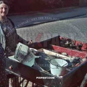 two women selling fish in a push cart in Kiel, Germany 1939